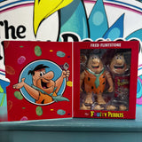 Fruity Pebbles Fred Flintstone action figure in red cereal box-style packaging